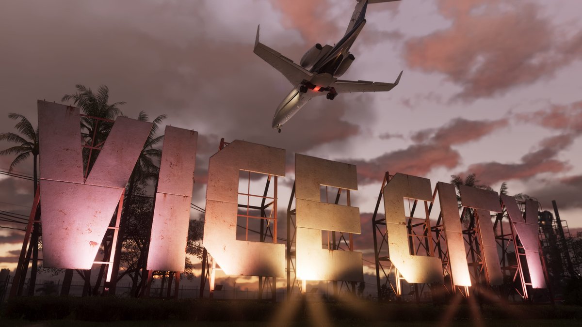 The giant Vice City letters sign at sunset in GTA 6, with a jet flying low overhead